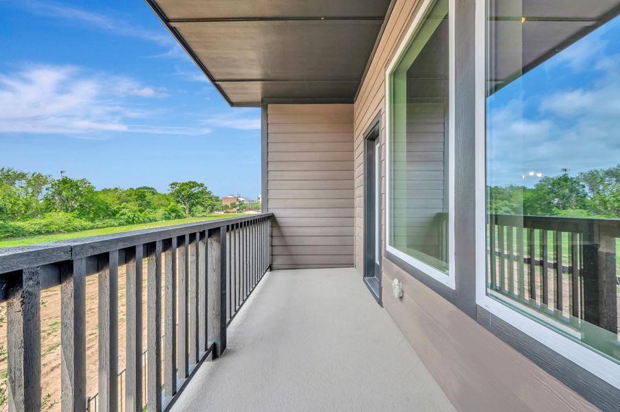 Exterior details and patio area of a home in Trails at Waterside - Villas Series, Fort Worth (Image 3).