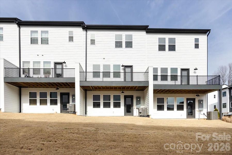 Rear of Home Showcase 2 Outdoor Living Spaces with Privacy Walls on either Side Rear of Home Showcase 2 Outdoor Living Spaces with Privacy Walls on either Side