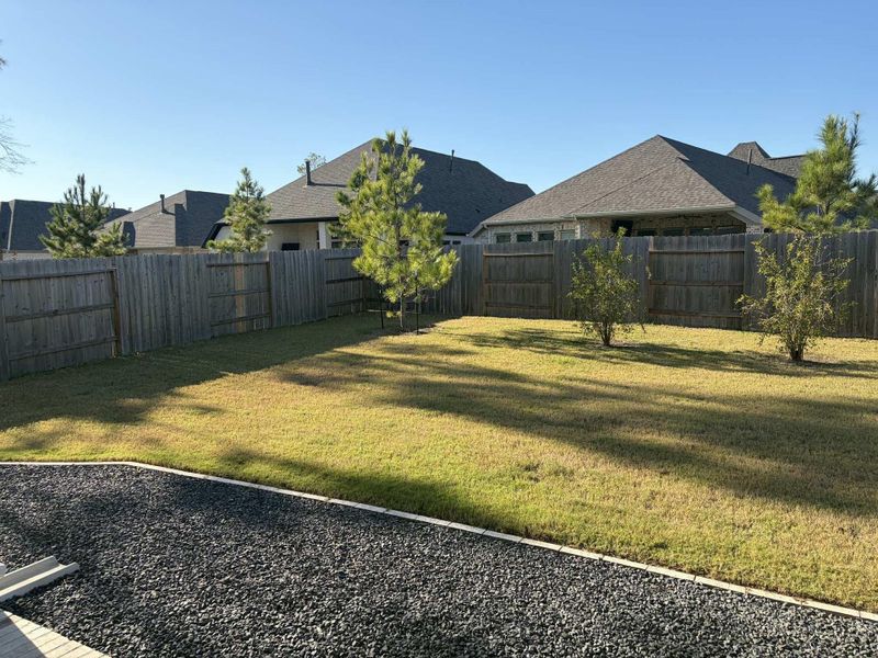 Exterior details and patio area of a home in Evergreen, Conroe (Image 19). Exterior details and patio area of a home in Evergreen, Conroe (Image 19).