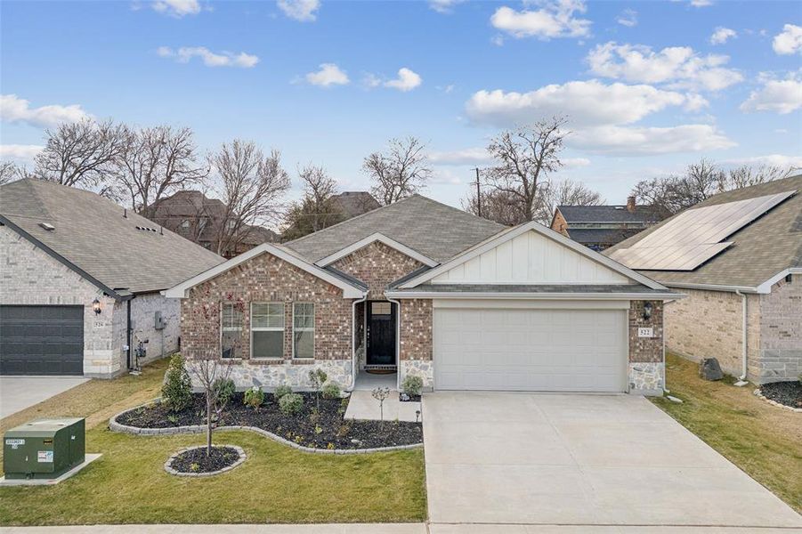 Front exterior of a new home in Westmoor, Sherman, TX, highlighting curb appeal (Image 26).