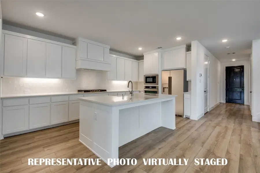 Style and sophistication abound in this dream kitchen!  REPRESENTATIVE PHOTO VIRTUALLY STAGED
