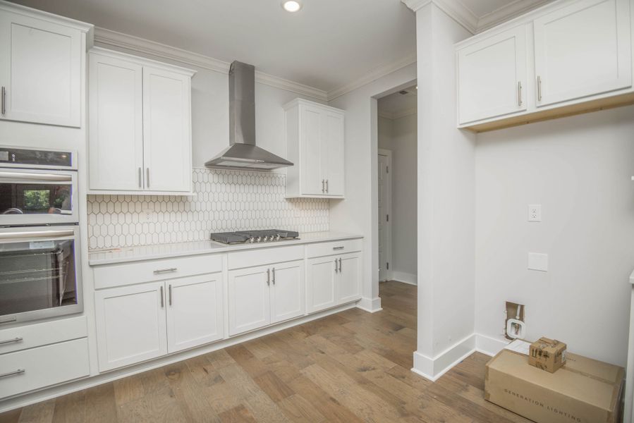 *Photo of example home. Selections and Finishes May Vary.* *Photo of example home. Selections and Finishes May Vary.*