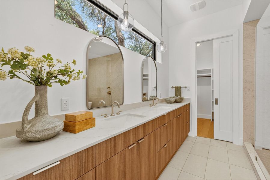 Large primary bathroom with lots of natural light without sacrificing privacy. Large primary bathroom with lots of natural light without sacrificing privacy.