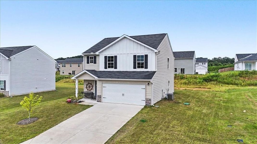 Front exterior of a new home in Kingston Park, Kingston, GA, highlighting curb appeal (Image 24).