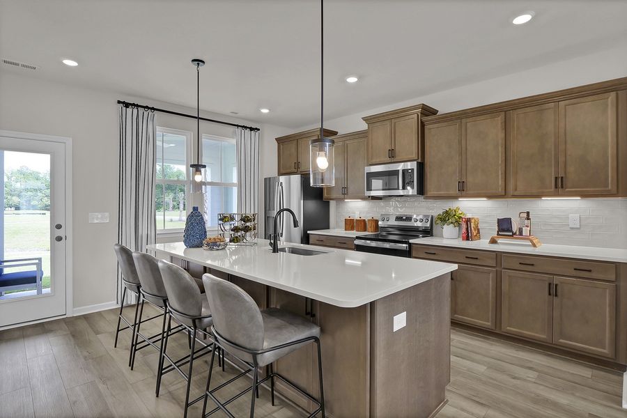 Representative furnished interior of a home built from the Hyacinth - Vanguard Collection by Mungo Homes in Avenue One, Castle Hayne (Image 3).