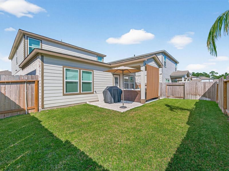 Exterior details and patio area of a home in Lakes at Black Oak, Magnolia (Image 24). Exterior details and patio area of a home in Lakes at Black Oak, Magnolia (Image 24).
