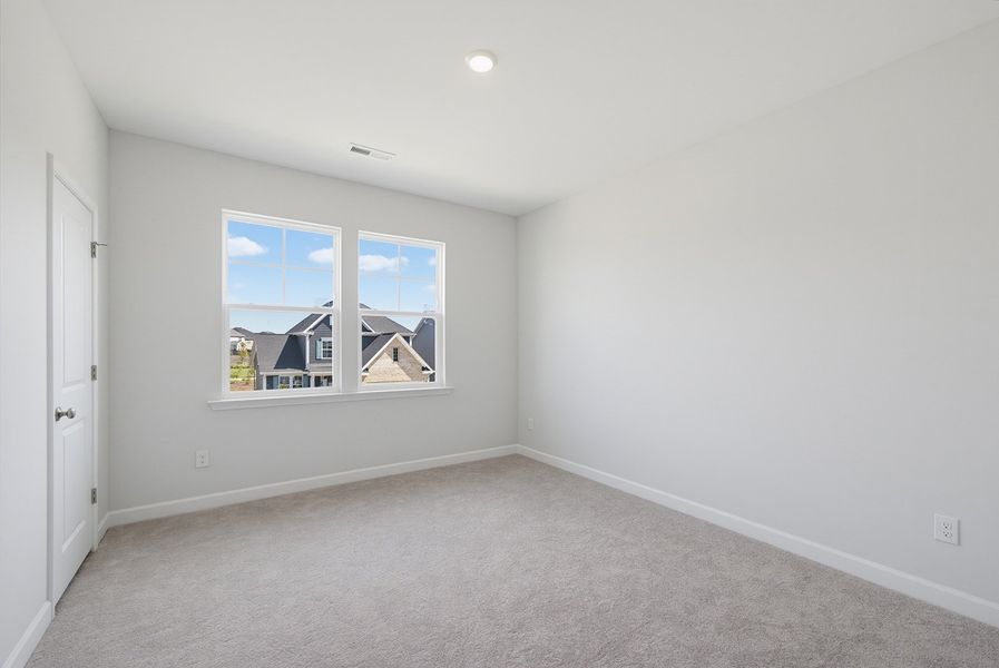 Spacious, unfurnished interior of a new home in Sweetbrier, Durham (Image 31).