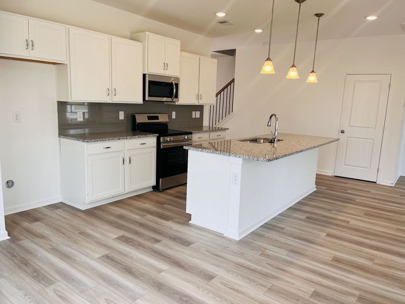 Furnished interior view inside a new home in Marlin Pointe, White House (Image 2).
