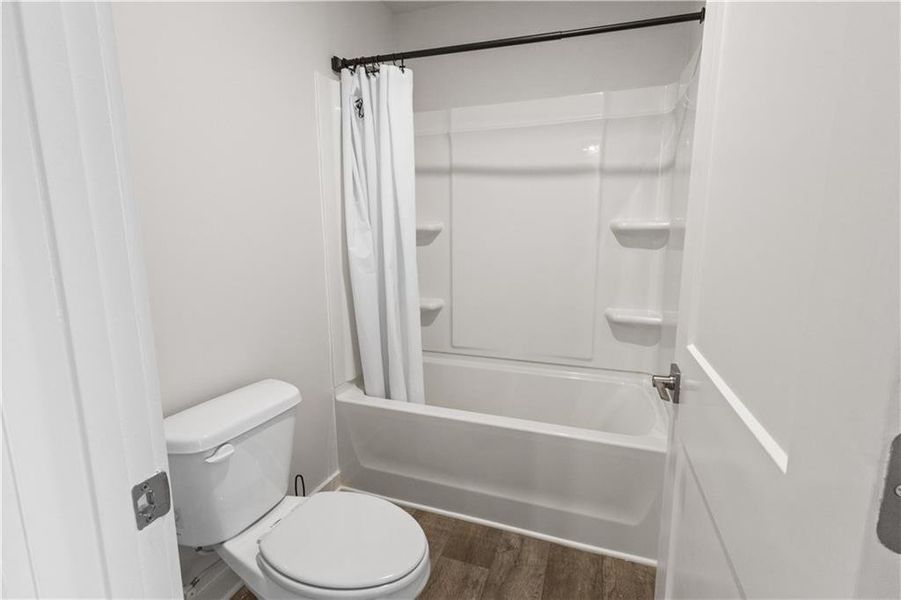 Furnished interior view inside a new home in The Enclave at Dial Farm Phase III, Walnut Grove (Image 6).