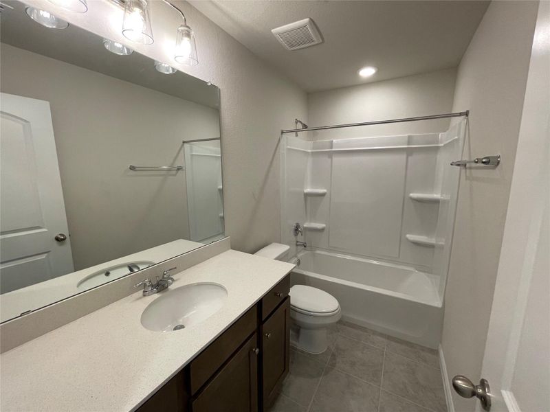 Furnished interior view inside a new home in Covered Bridge, Hutto (Image 5). Furnished interior view inside a new home in Covered Bridge, Hutto (Image 5).