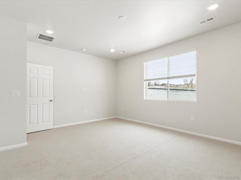 Spacious, unfurnished interior of a new home in Poudre Heights: The Alpine Collection, Windsor (Image 35).