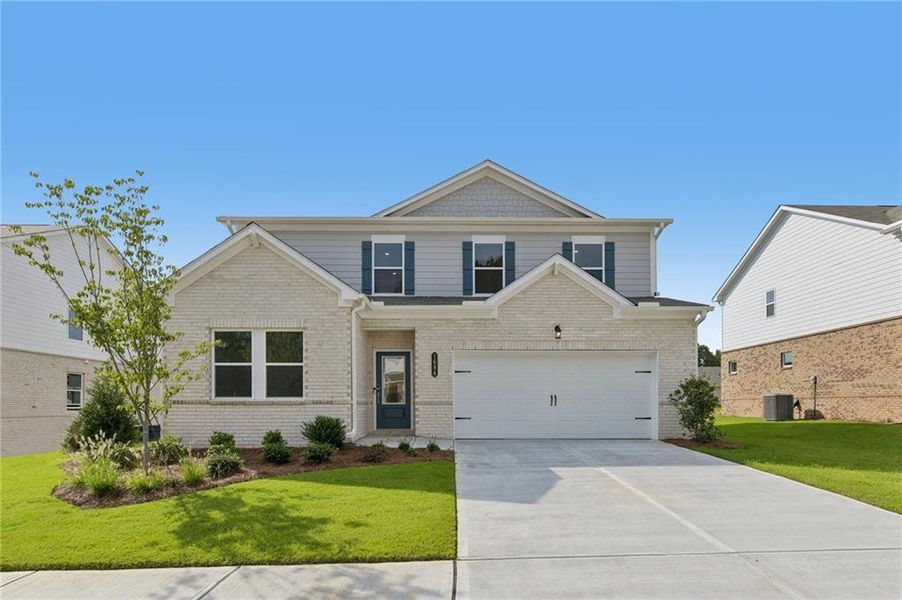 Front exterior of a new home in Windance Lake, Loganville, GA, highlighting curb appeal (Image 1). Front exterior of a new home in Windance Lake, Loganville, GA, highlighting curb appeal (Image 1).