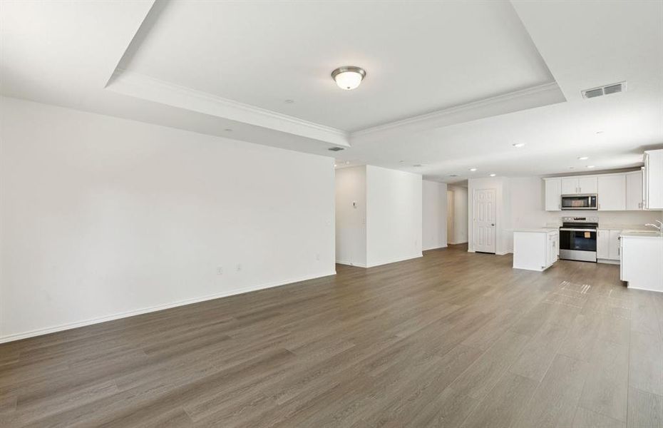 Sunlit gathering room designed for relaxation and entertainment Sunlit gathering room designed for relaxation and entertainment