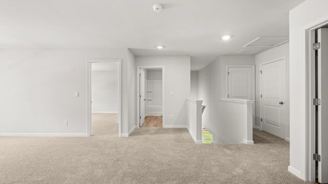 Spacious, unfurnished interior of a new home in Northwoods at Mirror Lake, Villa Rica (Image 46).