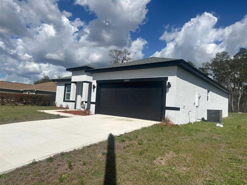 Front exterior of a new home in , Ocala, FL, highlighting curb appeal (Image 20).