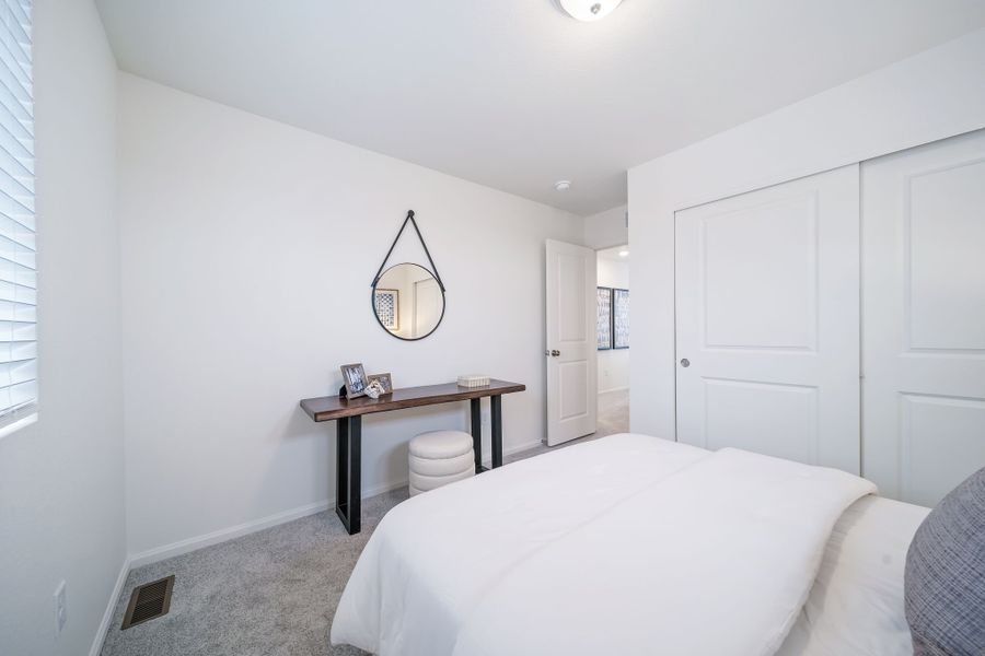 Furnished interior view inside a new home in Reunion, Commerce City (Image 27). Furnished interior view inside a new home in Reunion, Commerce City (Image 27).