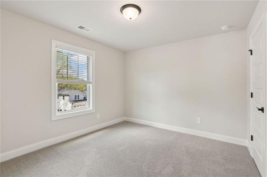 Spacious, unfurnished interior of a new home in Hemingway - Reserve Series, Cumming (Image 44).