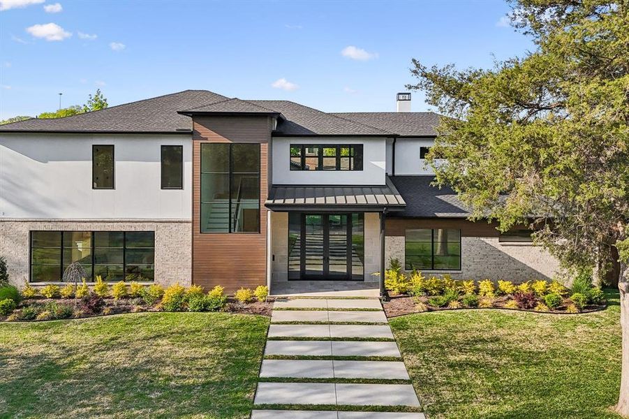 Front exterior of a new home in , Dallas, TX, highlighting curb appeal (Image 25).