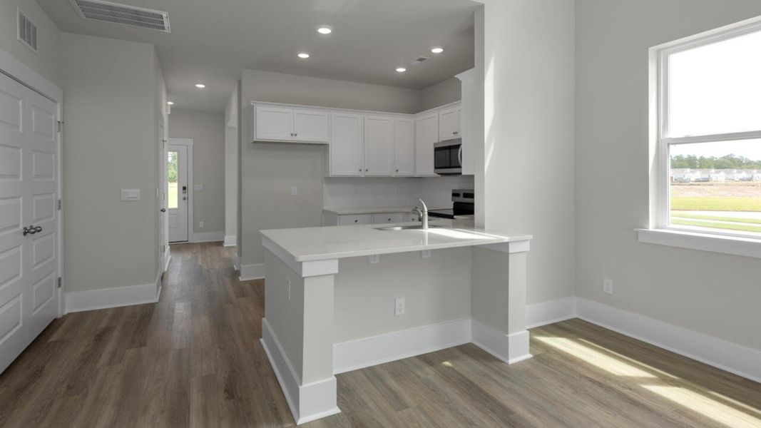 Furnished interior view inside a new home in Indigo Preserve Townhomes, Leland (Image 9).
