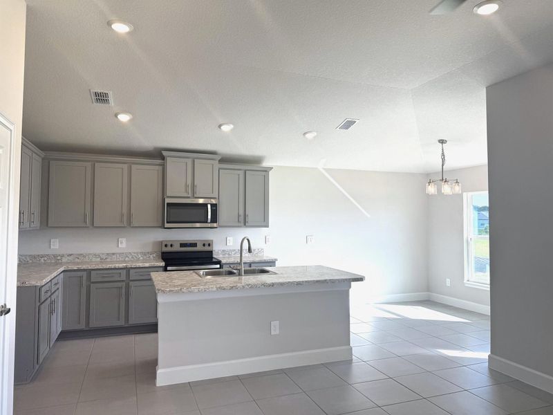 Furnished interior view inside a new home in Waterstone 52, Fort Pierce (Image 6). Furnished interior view inside a new home in Waterstone 52, Fort Pierce (Image 6).