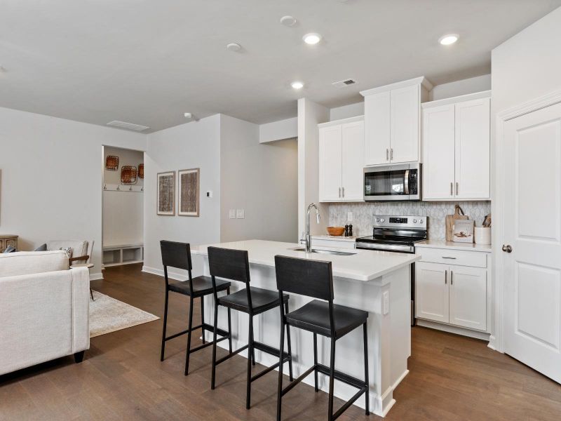 The sleek, modern kitchen makes meal-prep a breeze. The sleek, modern kitchen makes meal-prep a breeze.