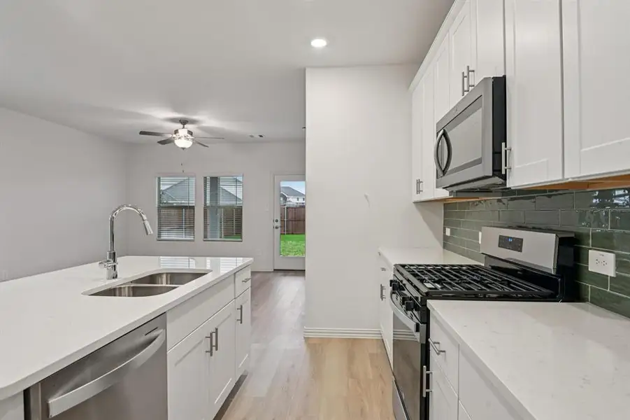 Photo is not of the actual home, but is an inspirational photo of builder’s model home and may depict options, furnishings, and/or decorator features that are not included.