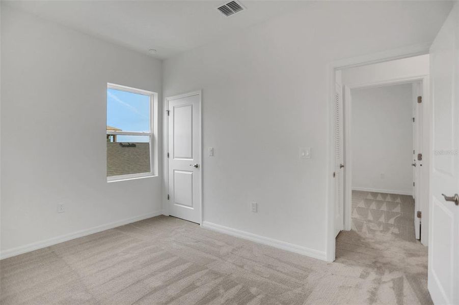 Spacious, unfurnished interior of a new home in Turnleaf, Punta Gorda (Image 20).