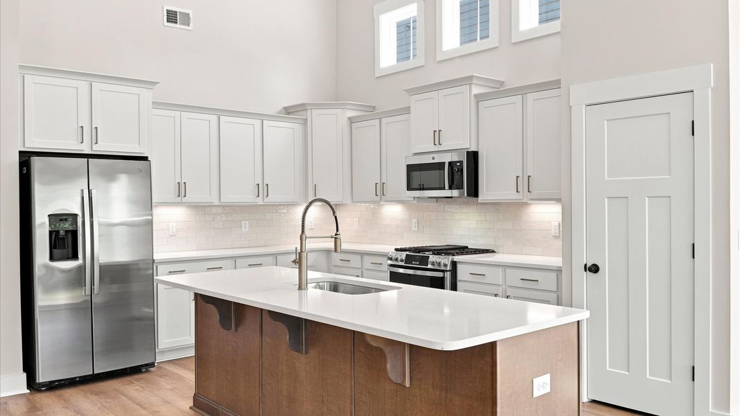 Well-designed kitchen with a center island and tasteful finishes that elevate everyday living located in Spartanburg, SC