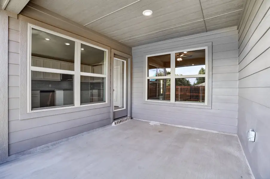Exterior details and patio area of a home in Craftsman's Corner, Cleburne (Image 4).