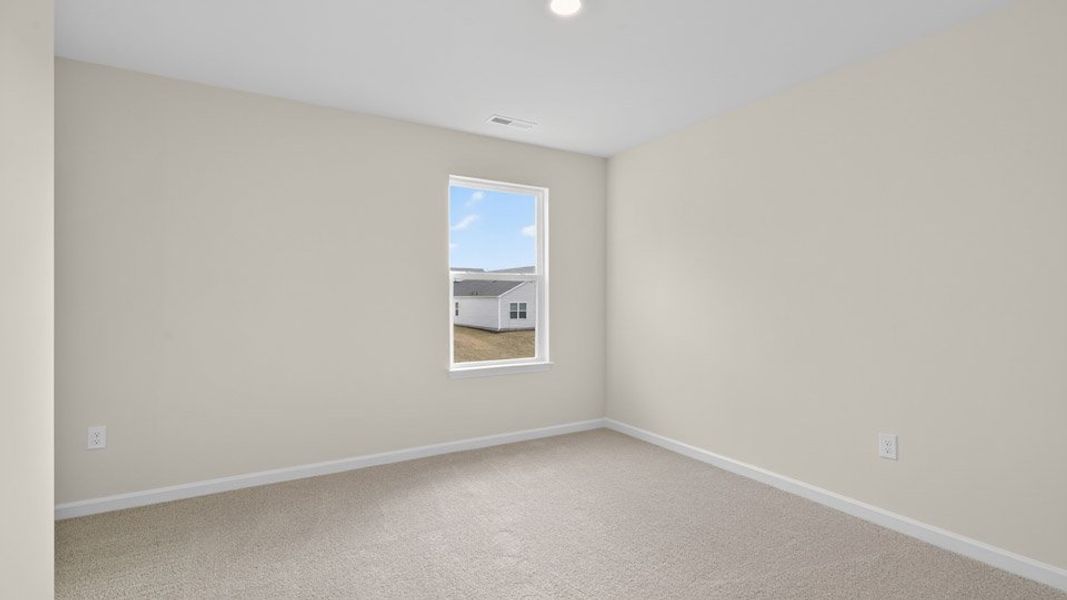 Spacious, unfurnished interior of a new home in Honeycutt Oaks, Angier (Image 28).