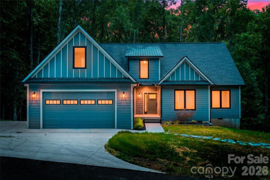 Front exterior of a new home in , Candler, NC, highlighting curb appeal (Image 21).