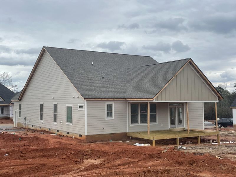 Front exterior of a new home in Tubbs Mountain Estates, Travelers Rest, SC, highlighting curb appeal (Image 17). Front exterior of a new home in Tubbs Mountain Estates, Travelers Rest, SC, highlighting curb appeal (Image 17).