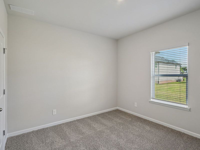 Spacious, unfurnished interior of a new home in Northwoods at Mirror Lake, Villa Rica (Image 17).