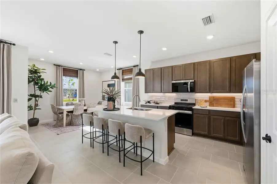 Furnished interior view inside a new home in Brystol North at Wylder, Port St. Lucie (Image 11).