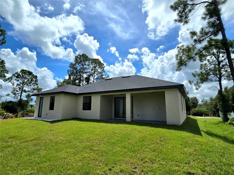 Exterior details and patio area of a home in , Lehigh Acres (Image 21). Exterior details and patio area of a home in , Lehigh Acres (Image 21).