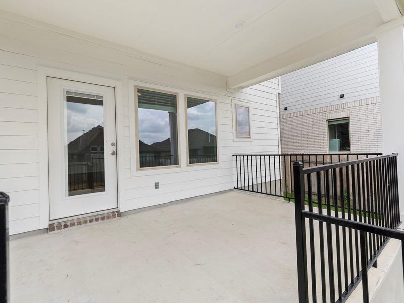 Exterior details and patio area of a home in Crosswinds, Kyle (Image 3).