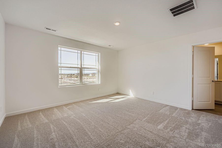 Spacious, unfurnished interior of a new home in Percheron: The Explorer Collection, Colorado Springs (Image 8).