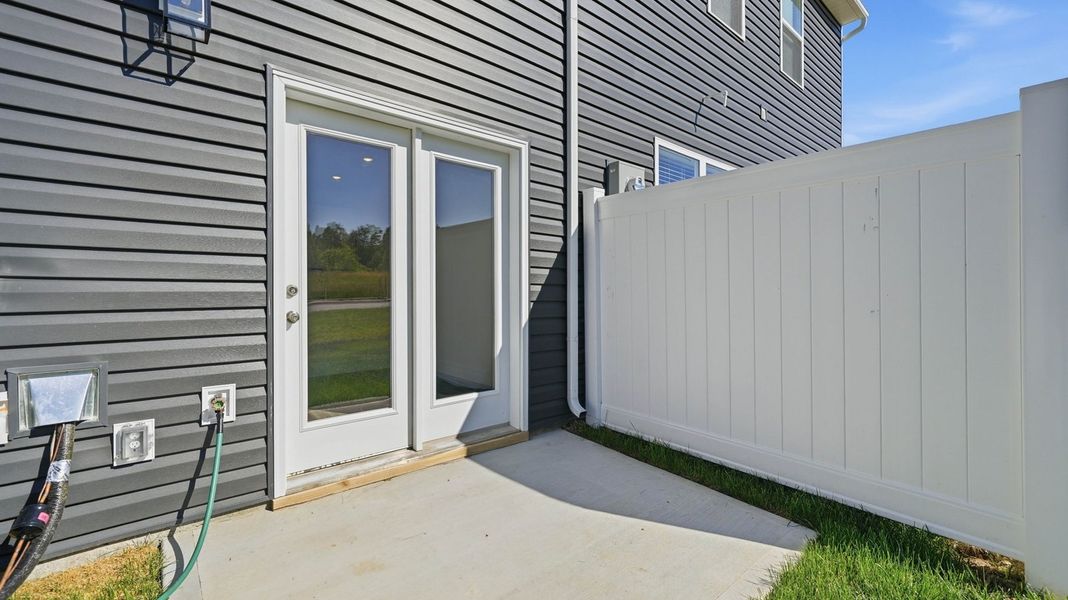 Exterior details and patio area of a home in The Arbor Townhomes, Kingsport (Image 4). Exterior details and patio area of a home in The Arbor Townhomes, Kingsport (Image 4).