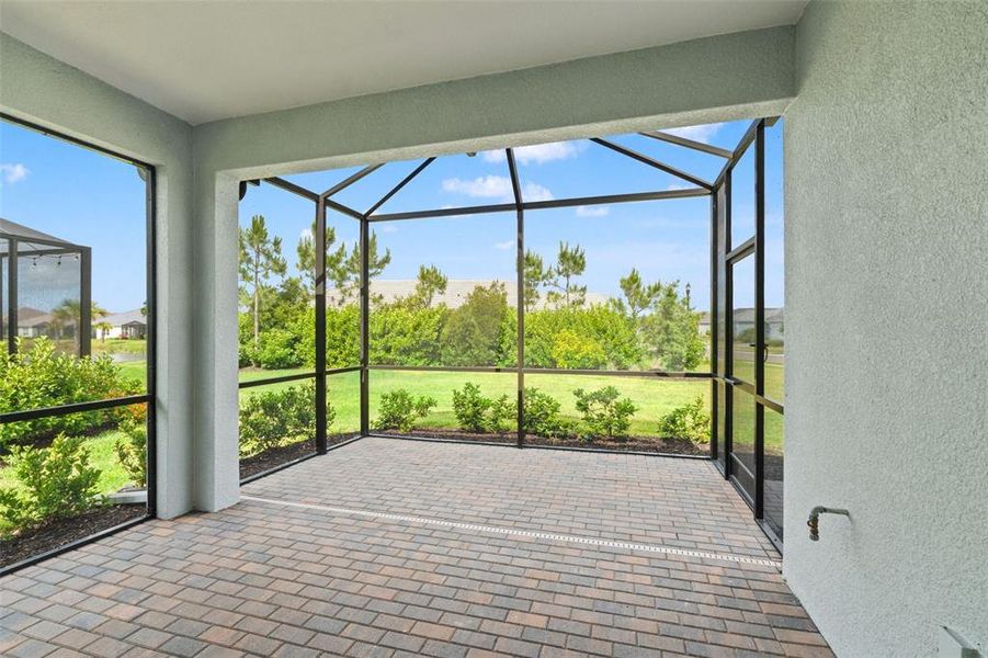 Exterior details and patio area of a home in Wysteria, Venice (Image 30).