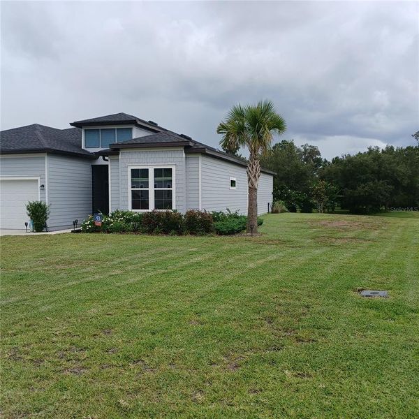 Exterior details and patio area of a home in Grand Park North, Dunnellon (Image 32). Exterior details and patio area of a home in Grand Park North, Dunnellon (Image 32).