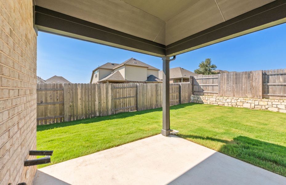 Exterior details and patio area of a home in Crescent Bluff, Georgetown (Image 4).