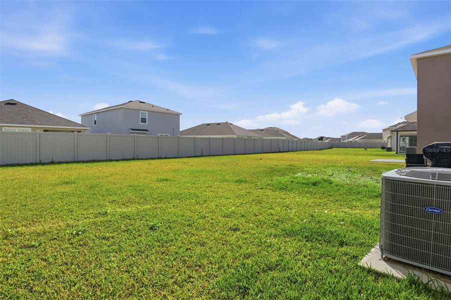Exterior details and patio area of a home in Farm at Varrea, Plant City (Image 3).