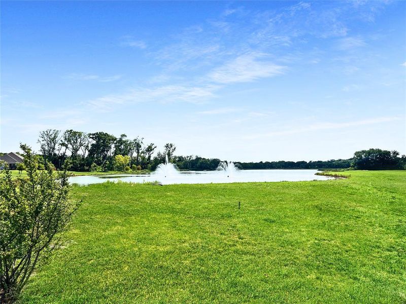 View of community area featuring a water view View of community area featuring a water view