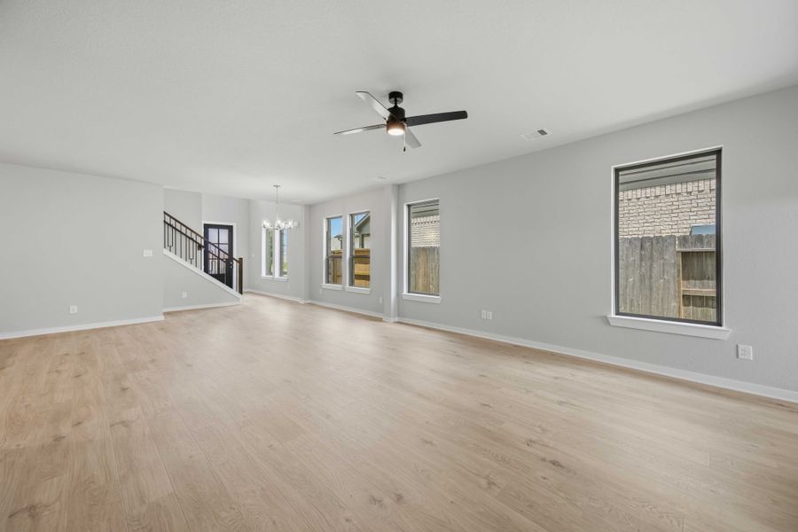 Spacious, unfurnished interior of a new home in Sunterra 40, Katy (Image 18).