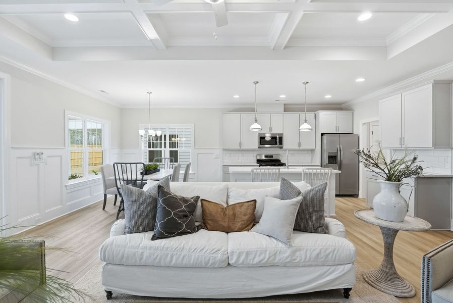 Representative furnished interior of a home built from the Kauai by Bill Clark Homes in The Sanctuary at Sunset Beach, Sunset Beach (Image 9).