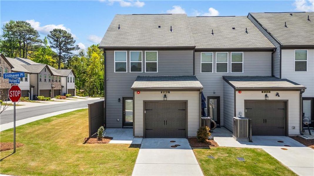 Front exterior of a new home in Laurelwood, Douglasville, GA, highlighting curb appeal (Image 27).