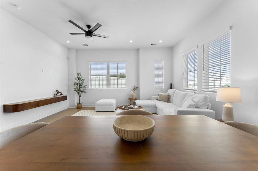 The dining area is seamlessly integrated into the open-concept kitchen, living, and dining space, offering plenty of room for a large dining table, perfect for hosting family gatherings, dinner parties, or everyday meals, while maintaining a bright, open, and inviting atmosphere.