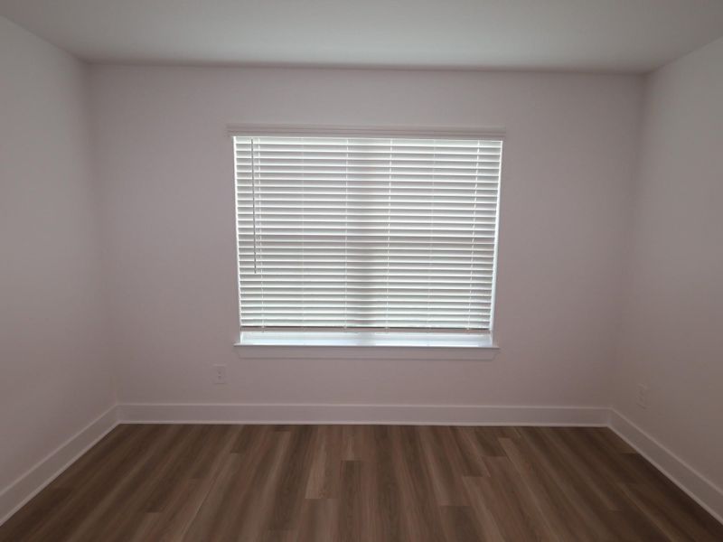Spacious, unfurnished interior of a new home in Lone Star Landing, Montgomery (Image 26).