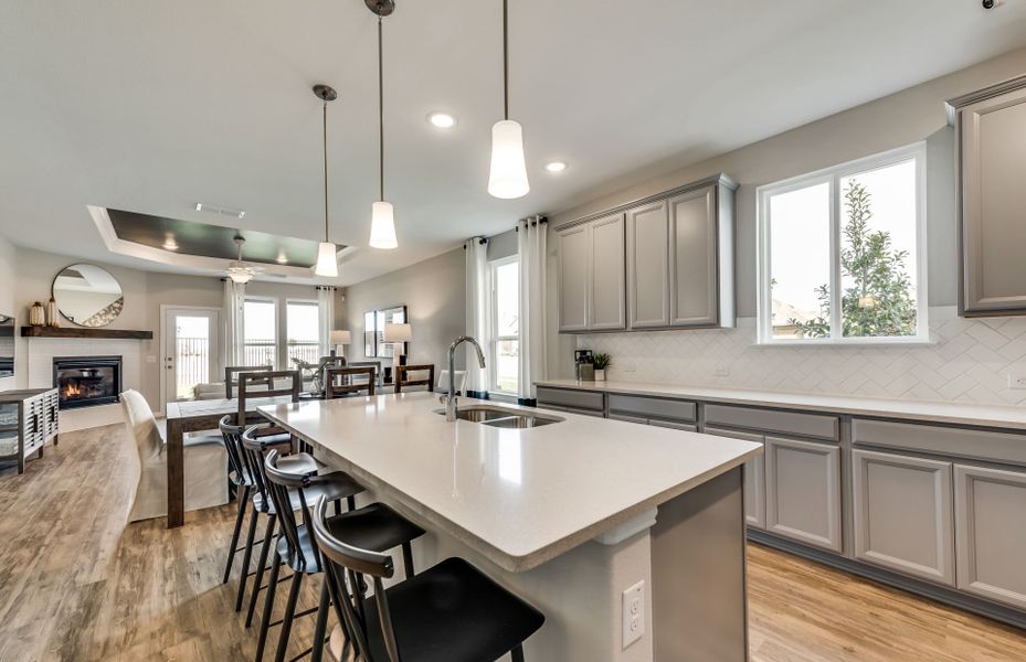 View of dining and gathering room from kitchen island