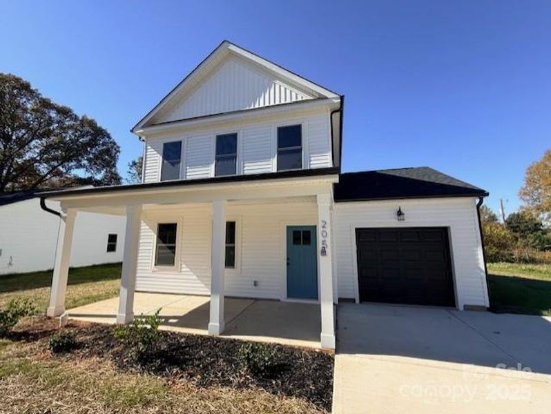 Front exterior of a new home in , Gastonia, NC, highlighting curb appeal (Image 28).